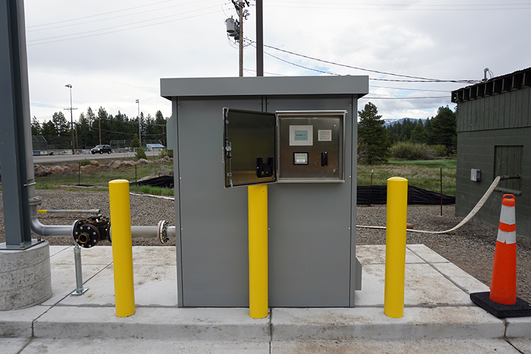 The custom Portalogic FS-72 Bulk Water Fill Station in Truckee, CA is tamper and theft proof with lockable doors, loops for padlocks, and all stainless steel hardware.